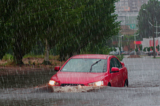 Car Rides In Heavy Rain On A Flooded Road