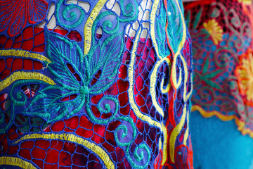 Close up of Balinese woman  traditional costume, sarong ,during ceremony in Bali-Indonesia