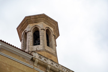 Fototapeta na wymiar Bell tower of a church.