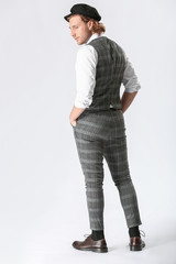 Stylish young man on white background