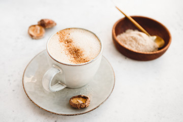 Mushroom latte with shiitake powder and unsweetened coconut-almond blend milk. Healthy useful vegan drink.