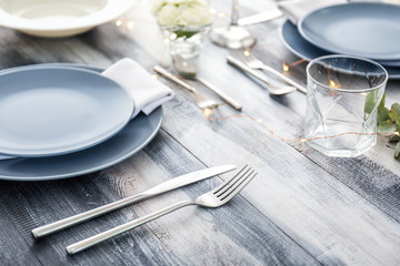 Beautiful table setting on wooden background