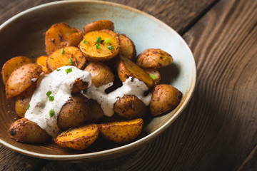 Baked Potatoes with Yoghurt Sauce