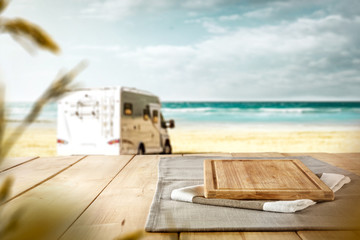 Table background of free space and summer background of beach 