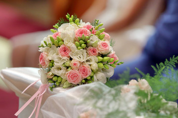 Bride wedding bouquet at church ceremony