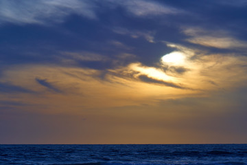 Naklejka na ściany i meble Magnificent sunset on the ocean coast.