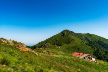 Fototapeta premium Eho hut located in Central Balkan national park in Old mountain, Bulgaria in hot summer day