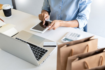 Doing Online Shopping On Digital Tablet At Home, browsing find need and want product content urge to buy with credit card payment.