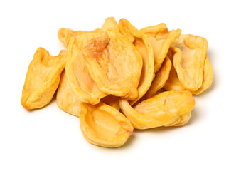 Close up of a pile of dried jackfruit chips isolated on white background