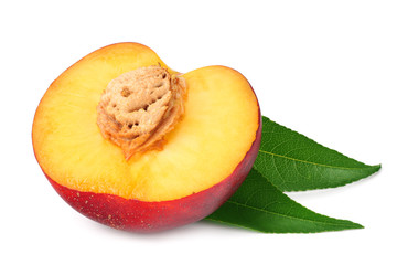 nectarine with green leaf isolated on a white background.