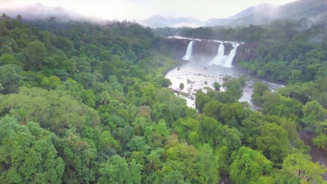 Aerial View of Athirapally Waterfalls -Kerala, India with lush green trees and plants