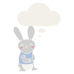 cute cartoon rabbit and thought bubble in retro style