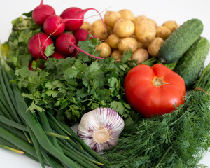 Vegetables lie on a white background