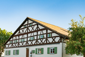 facade of half timbered house with shutters in Denkendorf, Germany