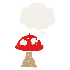 cartoon mushroom and thought bubble in retro style
