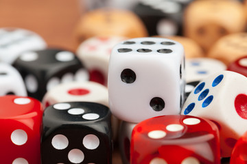 Dice on a wooden table. Concept for business risk.