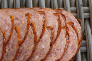 Dutch grilled sausage "grillworst" on wooden table background