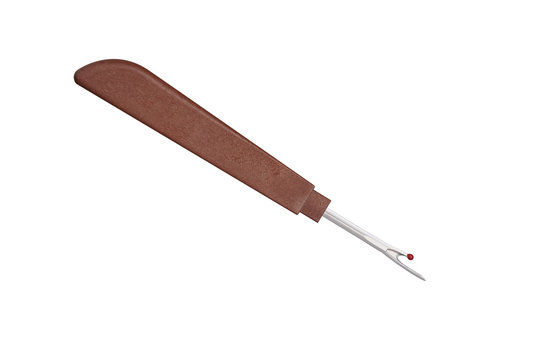 Seam ripper with brown plastic handle, cut out