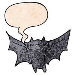 cute cartoon halloween bat and speech bubble in retro texture style