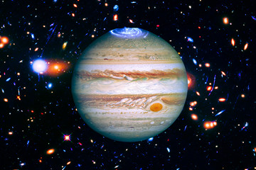 Jupiter and outer space, galaxies. The elements of this image furnished by NASA.