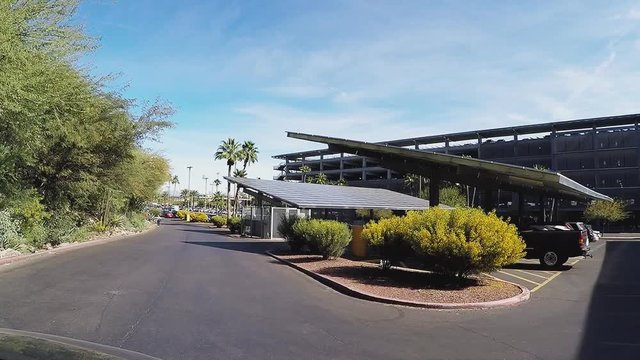 Driving Past Solar Panels Shading Parking Garage