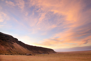 Fototapeta na wymiar Beautiful Icelandic landscape. Spectacular mountains with dramatic sky in the sunrise, Iceland