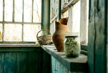 Old destroyed abandoned house and broken dishes. Chernobyl Nuclear Disaster Exclusion Zone