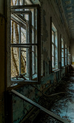 Fototapeta na wymiar Chernobyl nuclear disaster. An old abandoned house in the city of Pripyat