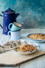 Spaghetti pasta on a wooden table
