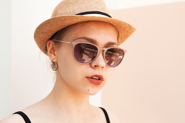 Portrait of a beautiful girl in hat