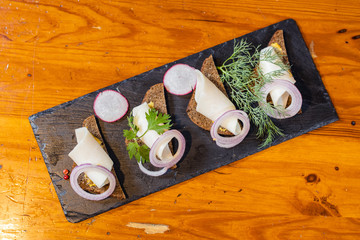 beer snacks on a dark rectangular stand