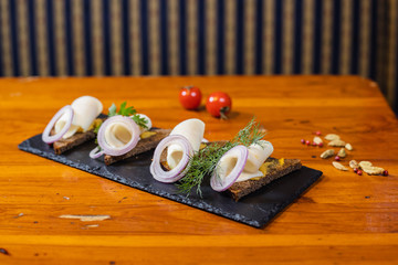beer snacks on a dark rectangular stand
