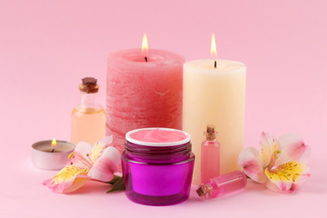 Obraz na płótnie Canvas Spa. Aromatherapy. Body care cosmetics. aroma oils and cream on a gentle pink background