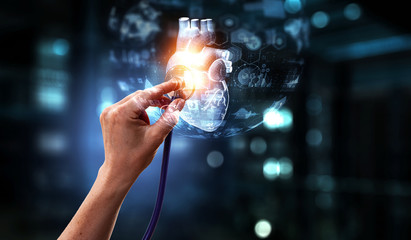 Doctor hand with stethoscope. Medical technology concept. Mixed media