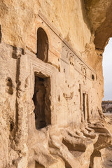 Entrance to the ancient Cavusin fortress and church Vaftizci Yahya, Saint John the Baptist in Cappadocia