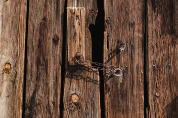 Old wooden gates with black backdrop