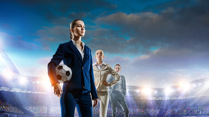 Business team on football stadium. Mixed media