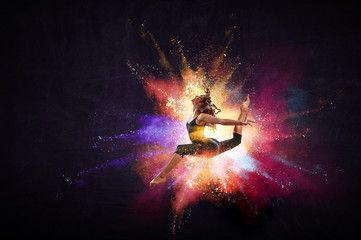 Young modern ballet dancer in a jump. Mixed media