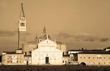 VENICE ITALY JUNE 01 2019: At sunset Campanile and the Church of San Giorgio Maggiore (16th-century...