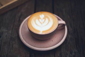 Hot latte coffee in the cup