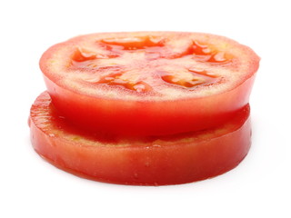Fresh ripe, red tomato slices isolated on white background