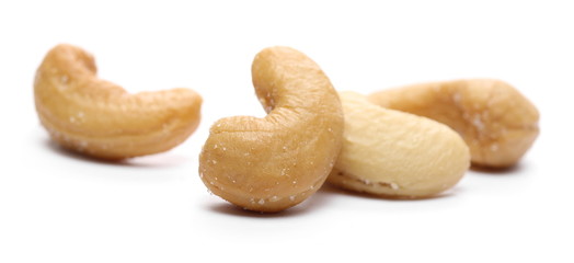 Salted cashew nuts isolated on white background