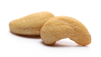 Salted cashew nuts isolated on white background