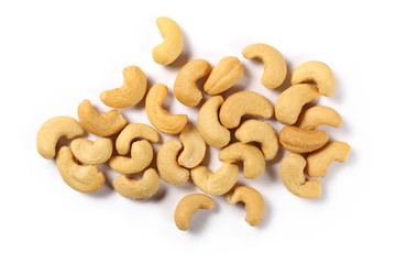 Salted cashew nuts isolated on white background, top view