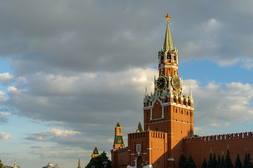 Fototapeta premium Evening summer view of Spasskaya Tower, the main tower of the Moscow Kremlin Red Square. Famous Kremlin chimes are historic clock on the Saviour Tower
