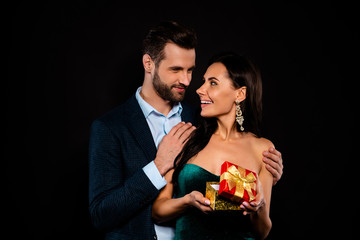 Close up photo beautiful she her classy chic lady he him his macho deliver receive giftbox pack satisfied unexpected wear plaid blue costume jacket velvet green shine dress isolated black background