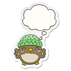 cute cartoon owl in hat and thought bubble as a printed sticker
