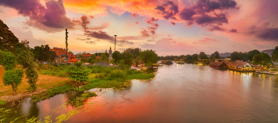 Sunset over Kwai river, Kanchanaburi, Thailand. Panorama - obrazy, fototapety, plakaty