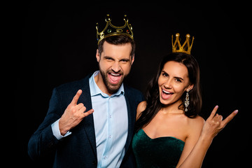 Close-up portrait of his he her she nice-looking gorgeous fascinating attractive luxury confident cheerful cheery two person life lifestyle showing rock roll sign isolated over black background