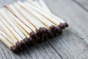 matches on a gray wooden board, macro shooting